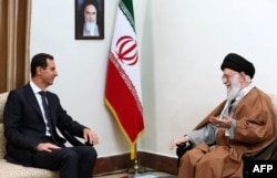 Iranian Supreme Leader Ayatollah Ali Khamenei meets Syria's then-president, Bashar al-Assad, in Tehran in February 2019.