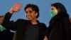 Opposition leaders Bilawal Bhutto Zardari (left) and Maryam Nawaz of Pakistan Democratic Movement (PDM) arrive to attend an anti-government rally in Lahore on December 13, 2020.