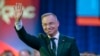 Polish President Andrzej Duda waves at the CPAC 2025 event in Washington on February 22.