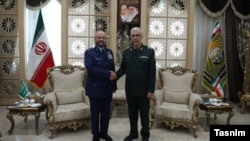 Fayyad al-Ruwaili, chief of the general staff of Saudi Arabia’s armed forces, meets his Iranian counterpart, Mohammad Baqeri, in Tehran on November 10.