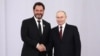 Opera singer Ildar Abdrazakov (left) and Russian President Vladimir Putin (file photo)