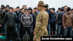 Georgian recruits line up for inspection at a military training center outside Tbilisi.