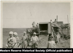 A permitted photograph taken by Williams on an official tour of a collective farm in August 1933. According to Whiting, many of these workers were drafted in from Soviet cities to help with gathering crops in Ukraine as so many local peasants had either died from starvation or were too malnourished to work. Whiting was confidentially told that the poor rations they received meant that many of these "volunteer" harvesters became seriously ill and some never recovered.