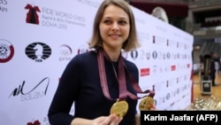 Anna Muzychuk celebrates after winning two gold medals in the World Chess Rapid and Blitz Championships 2016 in Doha in December 2016.