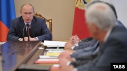 President Vladimir Putin chairs a meeting of Russia's Security Council in the Kremlin on July 6.