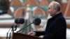 Russian President Vladimir Putin delivers a speech during a military parade on Victory Day in Moscow's Red Square on May 9.