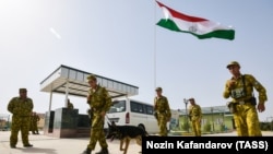 Tajik troops stand guard at the Somon border outpost on the border with Afghanistan, which also borders Uzbekistan and Turkmenistan. 