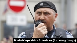 Sergei Kusyuk is seen now serving in Russian special police forces in Moscow in June 2017.