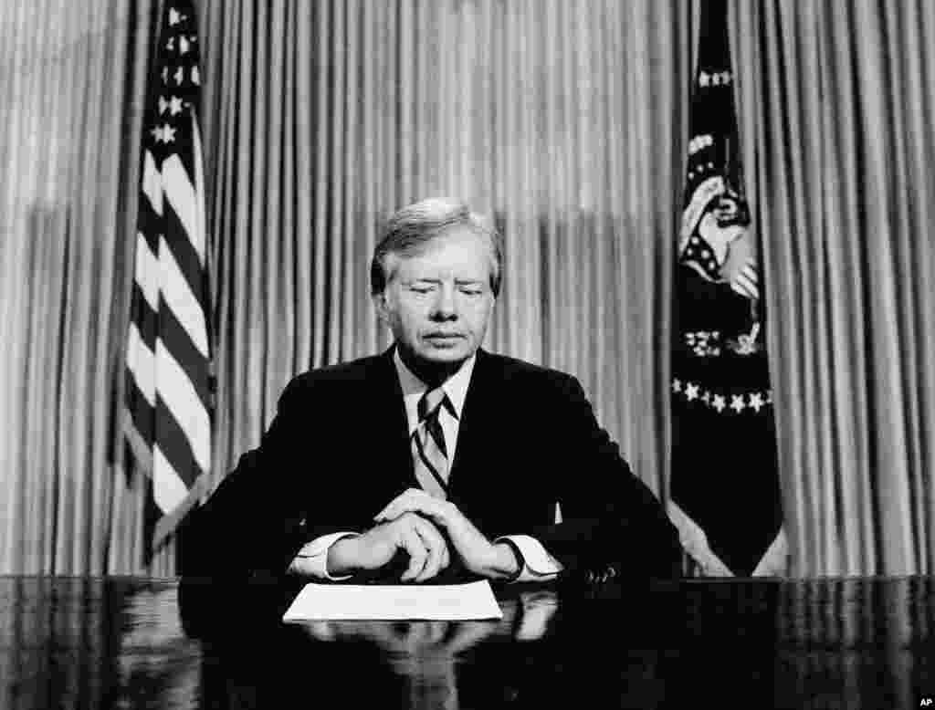 U.S. President Jimmy Carter is shown preparing for a televised address from the Oval Office on April 25, 1980. He reported that his decision to send a hostage-rescue mission into Iran had ended in disaster. Operation Eagle Claw had to be aborted. Eight U.S. servicemen died.