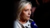 French far-right leader Marine Le Pen talks to journalists on July 7.