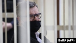 Opposition politician and banker Viktar Babaryka appears in court in Minsk in February.