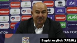 Kazakh national soccer team coach Stanislav Cherchesov speaks at a press conference after the Kazakhstan-Slovenia game on October 13.