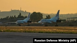 Russian Tu-22M3 bombers at the Russian-operated Khmeimim air base in western Syria (file photo) 