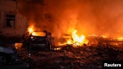 Cars burn after a Russian drone attack on the Ukrainian port city of Odesa on March 4. 