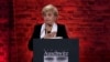 Poland - Tova Friedman, Holocaust survivor, speaking at memorial at 80th anniversary of Auschwitz liberation - AP screen grab