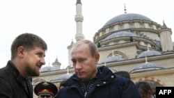 Vladimir Putin's (right) strategy for bringing security to the North Caucasus has left the Kremlin reliant on Chechnya's Ramzan Kadyrov.