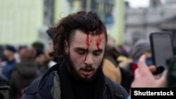 A bloodied protester at a rally in support of Russian opposition leader Aleksei Navalny in St. Petersburg on January 31.