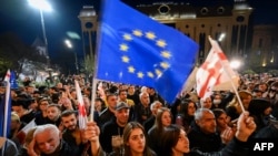 Pro-democracy demonstrators protest in Georgia in April against government initiatives they say were inspired by authoritarian Russia.