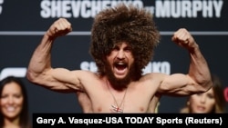 Georgian fighter Merab Dvalishvili reacts during a weigh-in for an MMA event. (file photo)