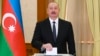 Azerbaijani leader Ilham Aliyev casts his vote in Nagorno-Karabakh in a snap presidential election on February 7. 