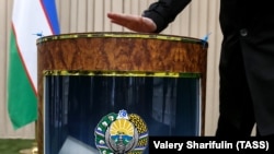 A man votes during the 2016 Uzbek presidential election in Tashkent.