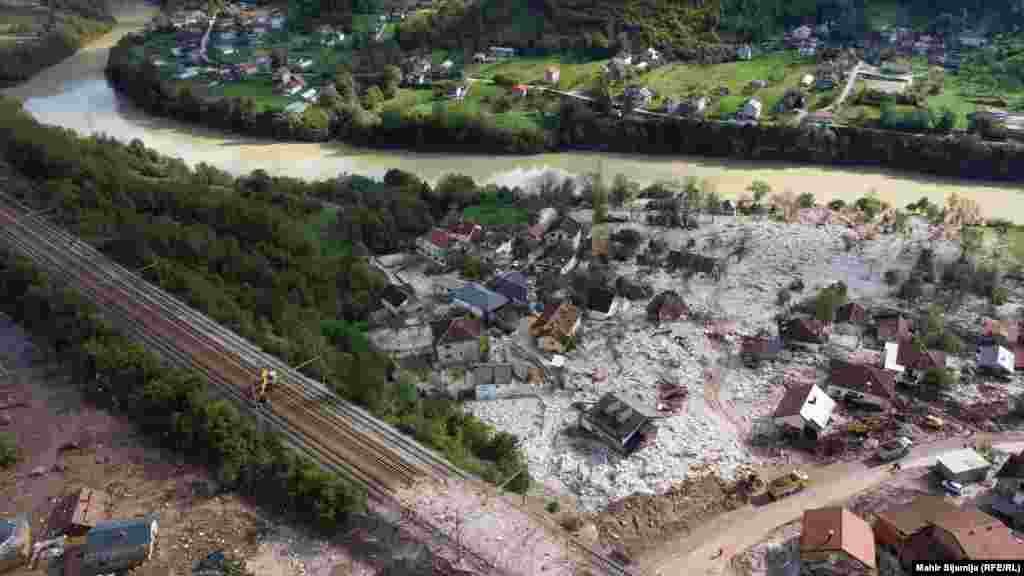 Part of the railway that passes through Donja Jablanica was destroyed by a landslide that tore through the village, leaving crushed houses and felled trees in its wake.