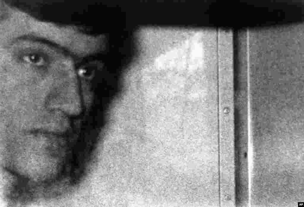 Fowzi Badavi-Negad is seen inside a police van arriving at Horseferry Road Magistrates Court in London on May 8, 1980. He had been an Iranian dock worker and was the only gunman to survive the embassy siege. Badavi-Nejad was given a life sentence in 1981. He was released in 2008 after a parole board concluded he was no longer a threat to society.