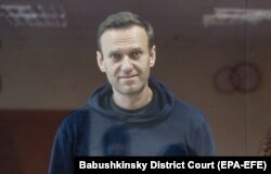 Navalny, charged with defaming a World War II veteran, attends a court hearing in Moscow on February 5.