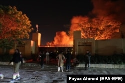 Smoke billows from inside the Serena hotel after a bomb blast in Quetta, the capital of Balochistan Province, on April 21. A Chinese delegation was staying at the hotel but was not present at the time of the blast.