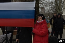 Voters visit a polling station during Russia's presidential election in Donetsk, Russian-controlled Ukraine on March 15.