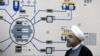 Iranian President Hassan Rohani visits the control room of the Bushehr nuclear power plant earlier this year. Tehran has long insisted that its nuclear program is solely for peaceful civilian purposes, even though many in the international community fear it could be used to produce atomic weapons. 