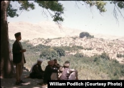 Afghan men gaze out over the village of Istalif, some 30 kilometers northwest of Kabul.