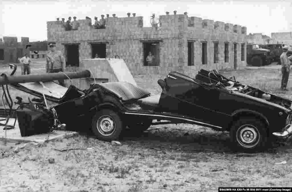 The aftermath of a barrier test at the secret East German facility Dr. Gerhard Salter, the head of research at The Berlin Wall Foundation, told RFE/RL these photos were taken at a site in Soviet-backed East Germany that remains secret to this day. &quot;We have files from the Federal Archives that mention [the testing sites], but we know nothing more about them,&quot; he said.&nbsp; &nbsp;