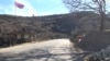 The Armenian flag flies over part of the border village of Shurnukh -- except for 12 houses.