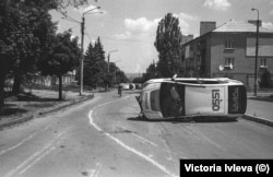 The streets of Lysychansk are littered with overturned cars.