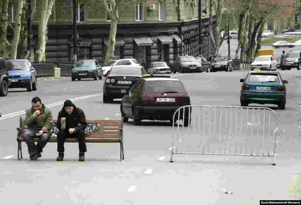 Demonstrators man a makeshift roadblock on Rustaveli Avenue during anti-government protests in 2009.&nbsp; In 2008, Georgian writer Guram Odisharia predicted that, &quot;without a harmonic relationship between the authorities and society, the people&rsquo;s hopes will always be deceived and the main player in our country&rsquo;s political history will be Rustaveli Avenue, and not Georgian politicians.&rdquo;&nbsp;