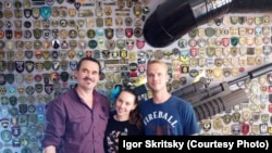 An undated photo Craig Lang (right) at a pizzeria in Kyiv