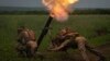 Ukrainian soldiers fire toward Russian positions on the front line in the Zaporizhzhya region on June 24.