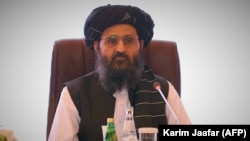 Mullah Abdul Ghani Baradar at peace talks between the Afghan government and the Taliban in Doha in July. 