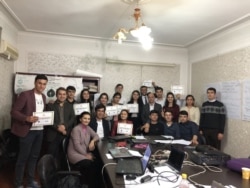 Tajik journalism students graduating from a one-week course in data journalism in Dushanbe.