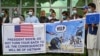 Afghan former interpreters for the U.S. and NATO forces gather during a demonstration in downtown Kabul on April 30.