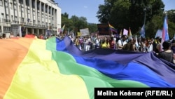 Activists take part in an LGBT Pride march in Sarajevo in August 2021.