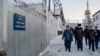 Prison guards walk inside a prison in the town of Kharp, in a photo released by the human rights ombudsman of the Yamalo-Nenets autonomous district on December 15.