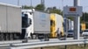 Trucks wait on the border between Serbia and North Macedonia. "I remember in 2007, when there were three or four vehicles at the border...And now, I think it's never under 50 vehicles," says Serbian businessman Dragan Stojsin. (file photo)