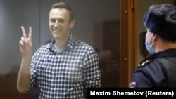 Russian opposition politician Aleksei Navalny at a hearing in Moscow to consider an appeal against an earlier court decision to change his suspended sentence to a real prison term on February 20