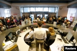 Russians who had taken out mortgages denominated in foreign currencies protest at a UniCredit bank in Moscow on January 28.