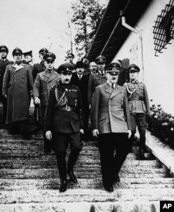 King Boris III of Bulgaria walks with Adolf Hitler in Germany in June 1941.