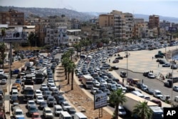 A massive traffic jam is seen in Sidon on September 23 as residents flee southern Lebanon amid ongoing Israeli air strikes.