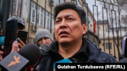 Investigative journalist Bolot Temirov gives an interview outside the courthouse in Bishkek on January 23, 2022.