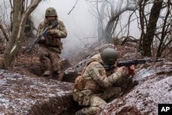 Ukrainian soldiers of 24th Mechanized Brigade train near the front line in the Donetsk region, Ukraine, on January 21.